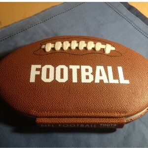 Brown Football leather history book